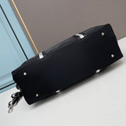 low-profile luxury black travel bag bag