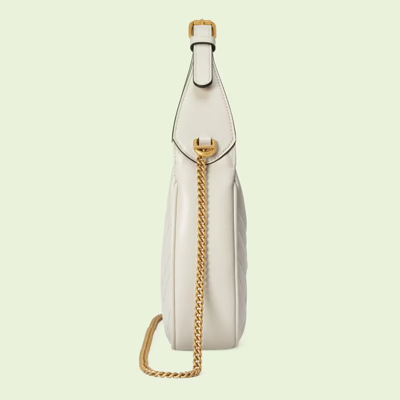 GG Marmont half-moon-shaped mini bag