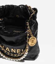 CHANEL 22 MINI HANDBAG